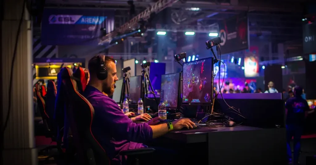gamers playing video games on a big gaming tournament as e sport