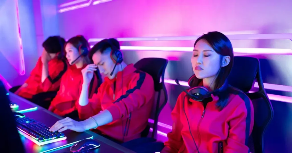 gamers concentrating for a the next round at a esports tournament